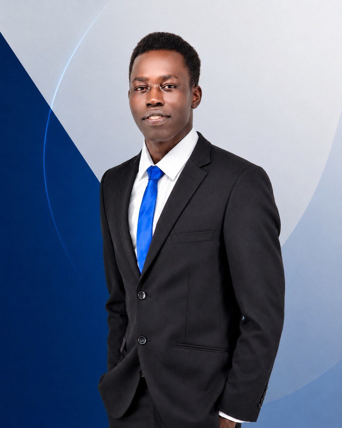 Makur Mangar, founder of Errandnese, in a dark suit and blue tie